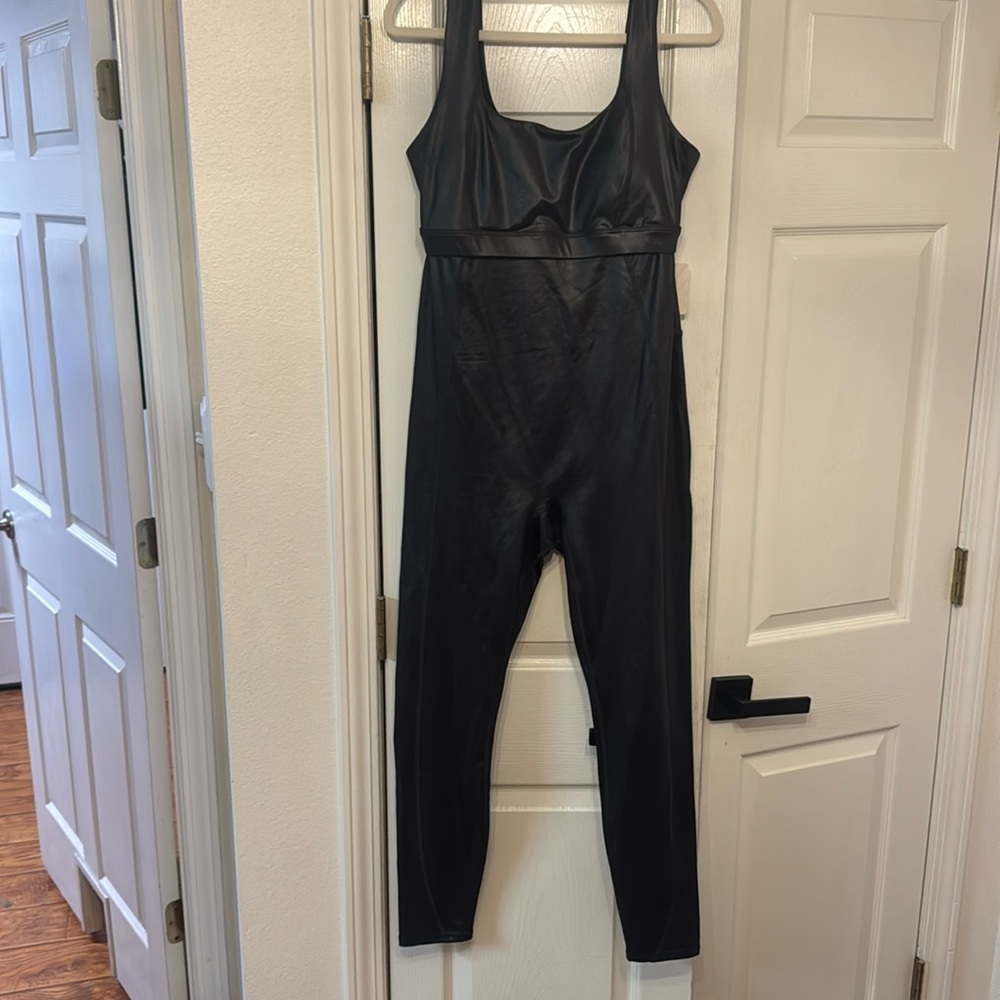 Khloe Kardashian collab motion 365 shine jumpsuit